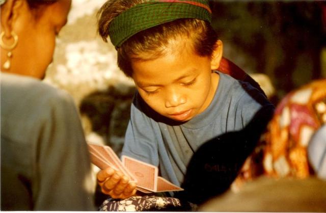 the kids playing with Willies cards.jpg